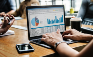 a person studying charts and data